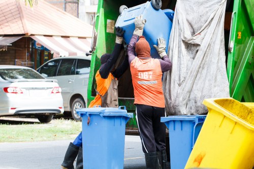 Office clearance team efficiently removing furniture